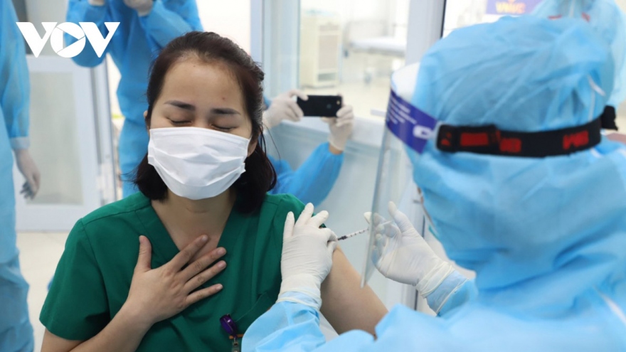 Female frontline healthcare workers get COVID-19 vaccine shot